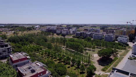 Apartment-buildings-around-a-park-aerial-shot-in-Montpellier