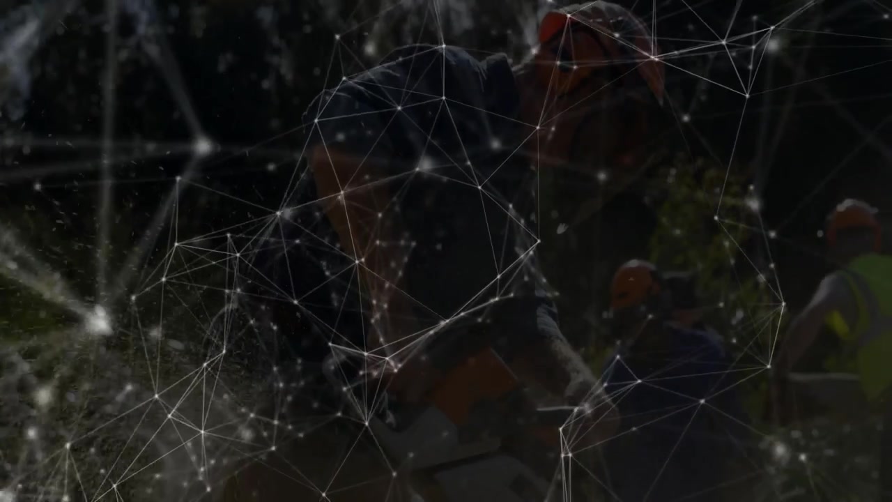 Man operating electric hedge trimmer in backyard landscaping, featuring network overlay technology