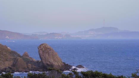 a rocky shore along the san francisco bay coastline - static wide angle view