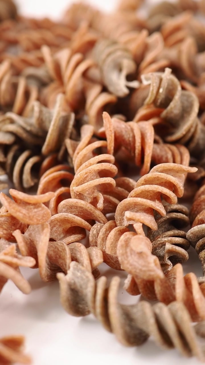 Close-Up of Uncooked Whole Wheat Fusilli Pasta