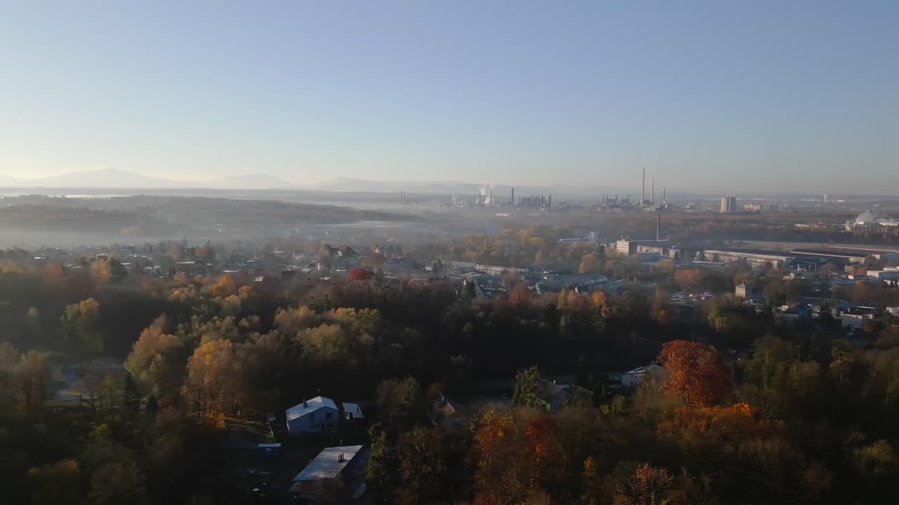 Drone cityscape view of industrial Ostrava skyline amid morning mist