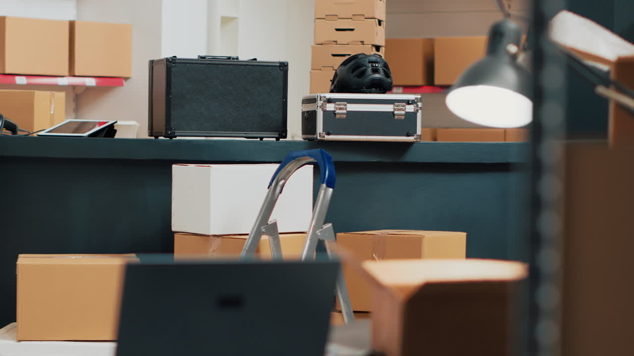 Storage room with boxes and laptop