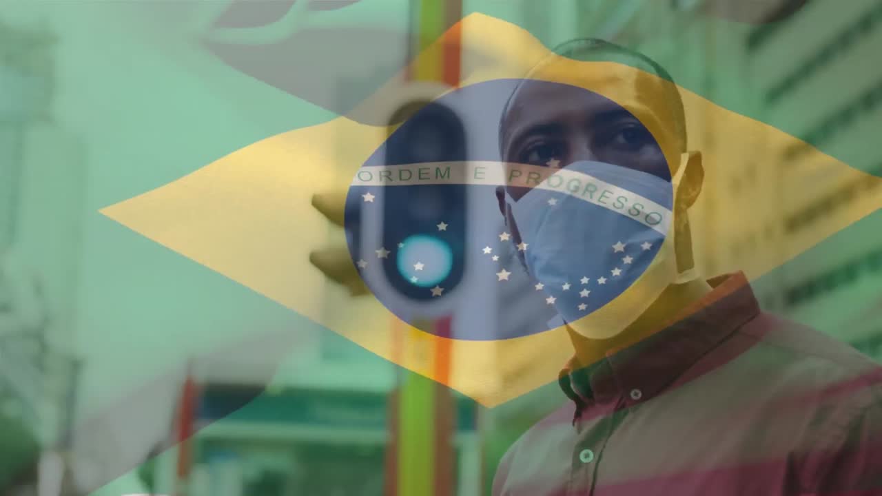 animación de la bandera de brasil ondeando sobre un hombre afroamericano con máscara facial en la calle de la ciudad