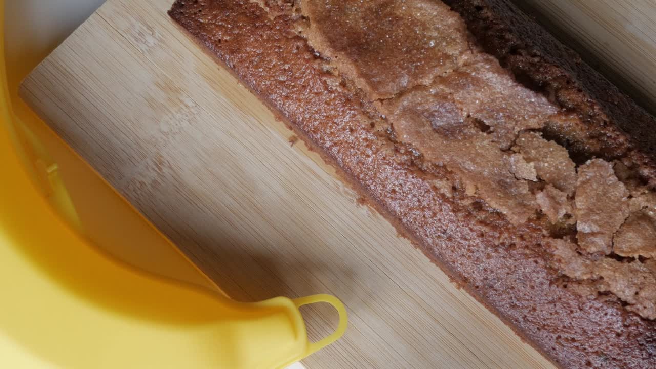Delicious homemade banana bread on a wooden board, warm and inviting