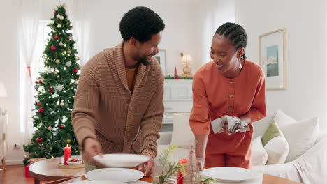 Couple,-christmas-and-table-while-setting-plate