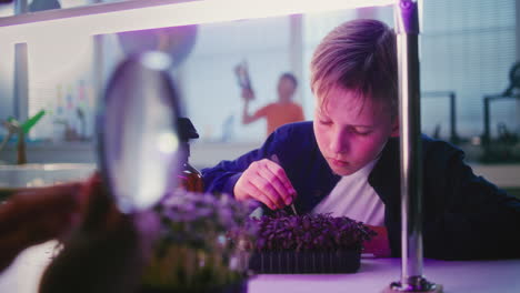 children doing a science experiment in a school lab