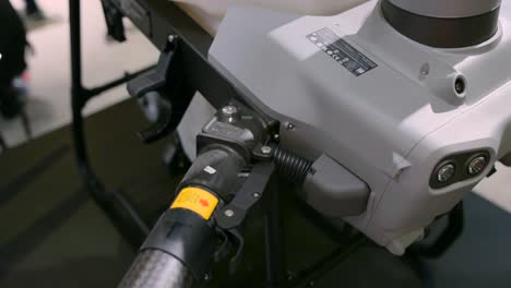 frame arm of dji agras t50 agricultural drone aircraft. closeup shot