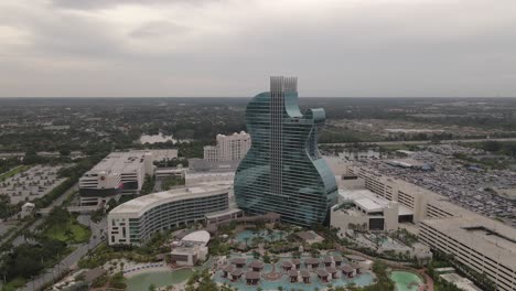 orbiting aerial of dramatic architecture of seminole hard rock hotel