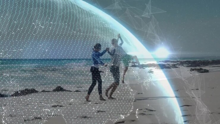Man and woman walking and lifting boy on beach sunlight making tech globe drifting showing bonding