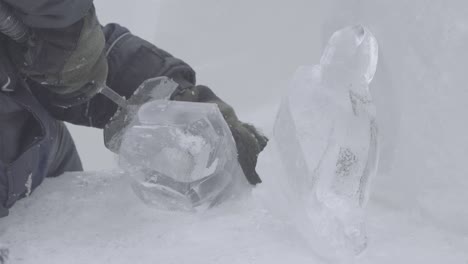 ice carving artist at work