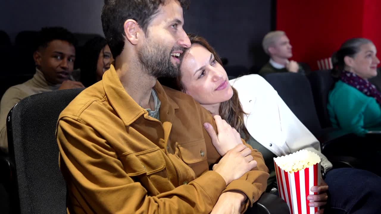 Couple Enjoying a Movie at the Cinema