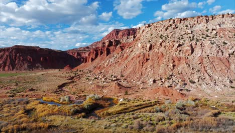 red rock formations and river in capitol reef national park, utah in usa