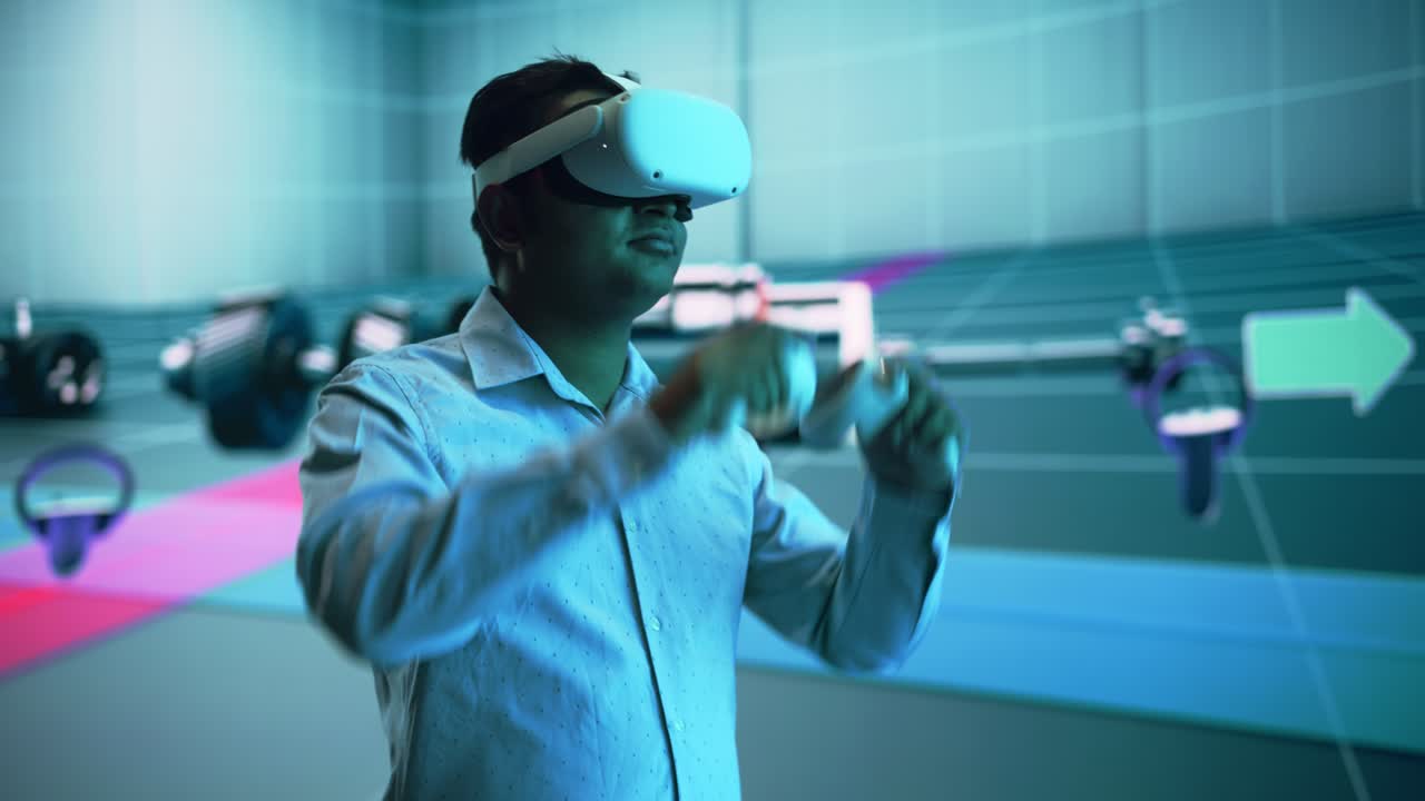 Automotive Engineer Using a VR Software to Showcase Electric Motor and Vehicle Platform in Interactive Environment on a Big Digital Screen. Multiethnic Male Engineer Using Headset and Controllers.