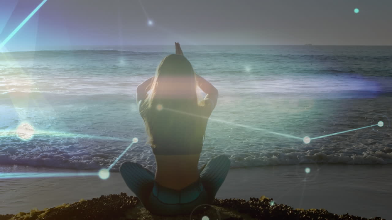 해변에서 요가를 연습하는 백인 여성에 대한 연결 네트워크의 활성화