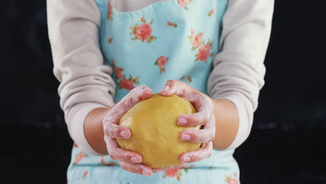 woman molding a dough 4k