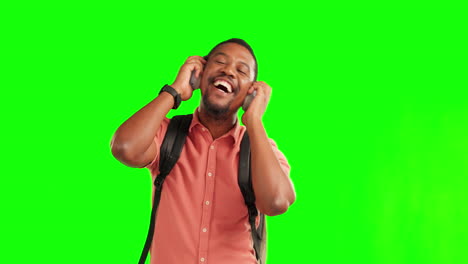 Green-screen,-travel-and-black-man-streaming-music