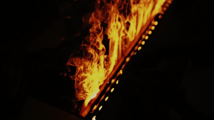 Close-Up of Hot Fireplace Flames inside House