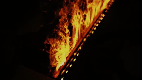 close-up of hot fireplace flames inside house