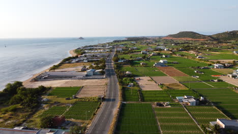 aerial flying forward over my hoa town in ninh thuan, vietnam