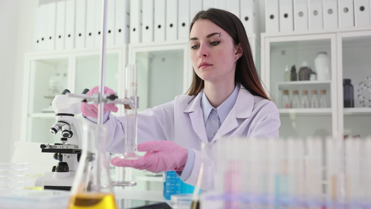 Female scientist conducting experiments in a laboratory