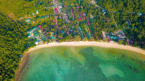 flying over the beautiful haad salad beach, island koh phangan, thailand