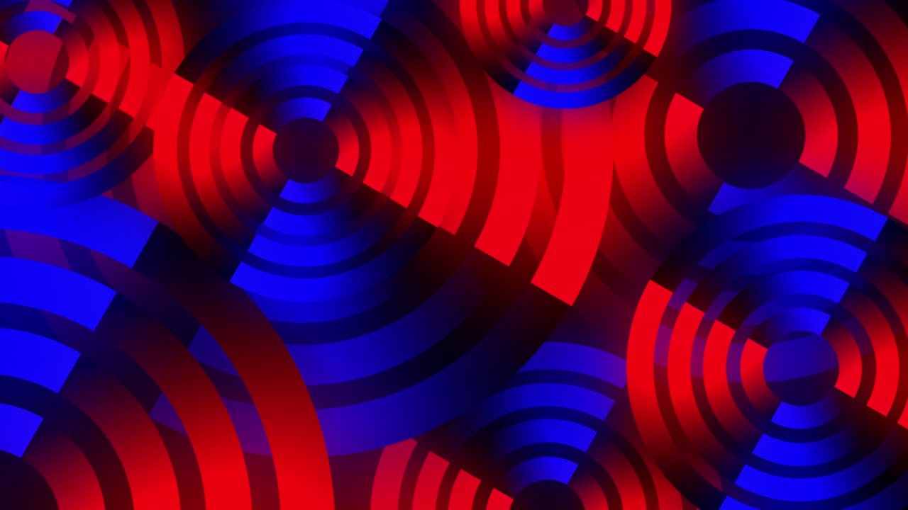 Abstraktní pozadí s barevnými digitálními kruhovými tvary v červené a modré barvě.