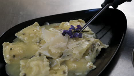delicious raviolis with parmesan cheese and herbs