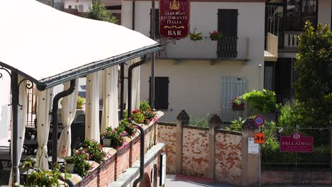 a bar and residential buildings in turin