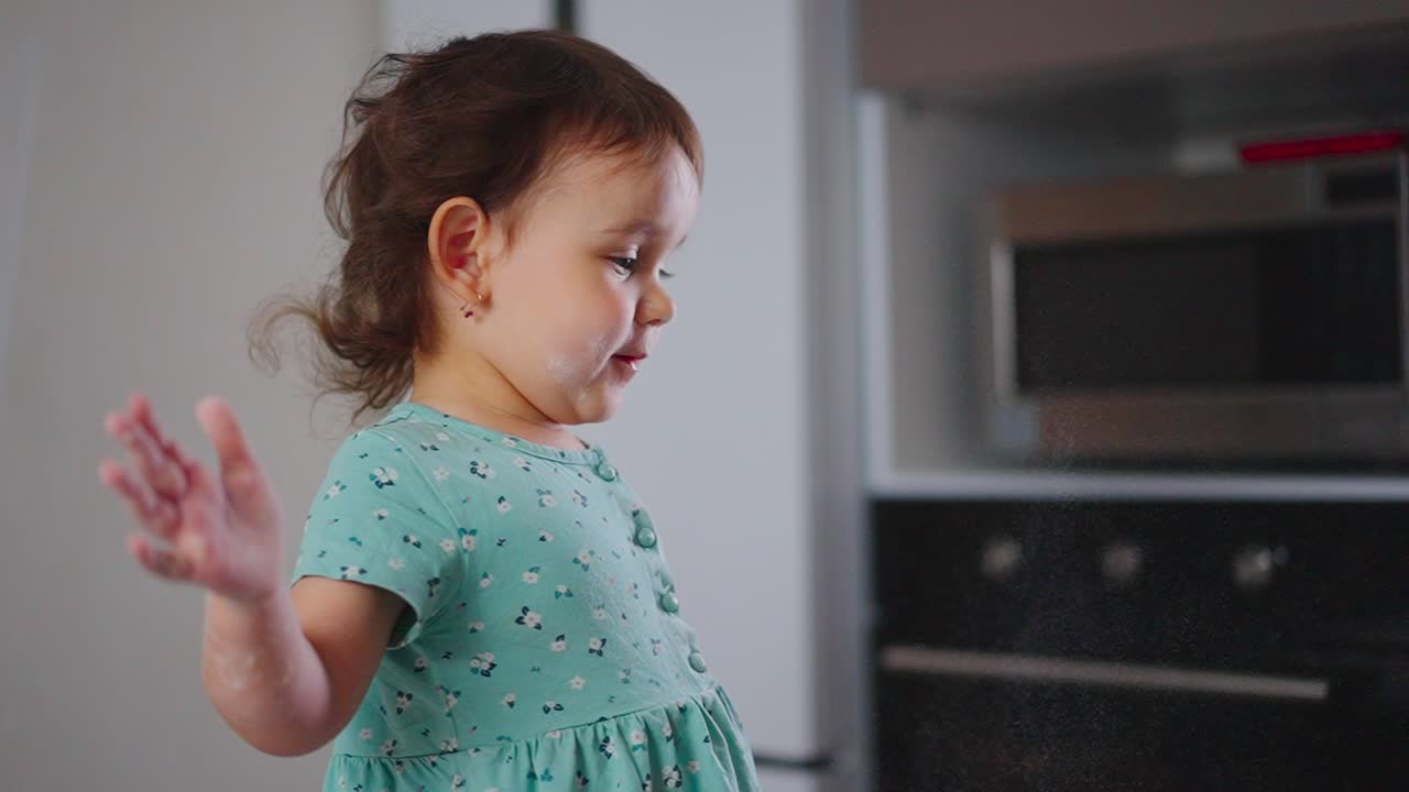 A Young Child Expressing Joy and Curiosity While Engaging with a Kitchen Appliance, Capturing Delightful Moments of Childhood Wonder and Discovery
