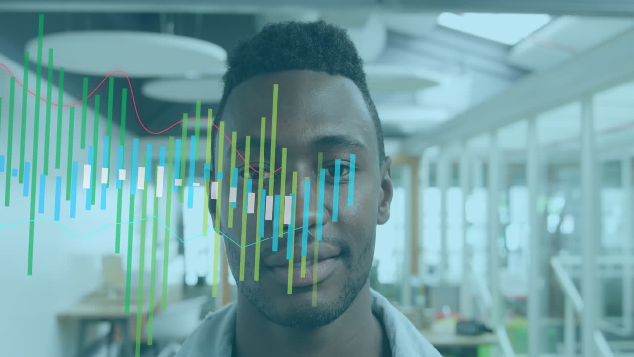 Animation of graphs over smiling african american man standing in office