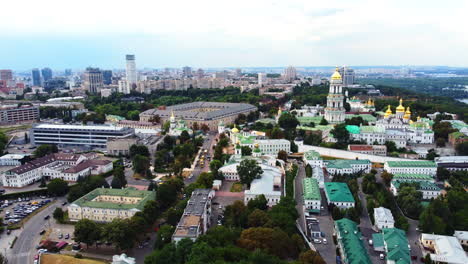 aerial cinematic view of the kyiv's historical district with orthodox churches and monasteries