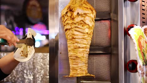 street vendor prepares shawarma in krabi, thailand