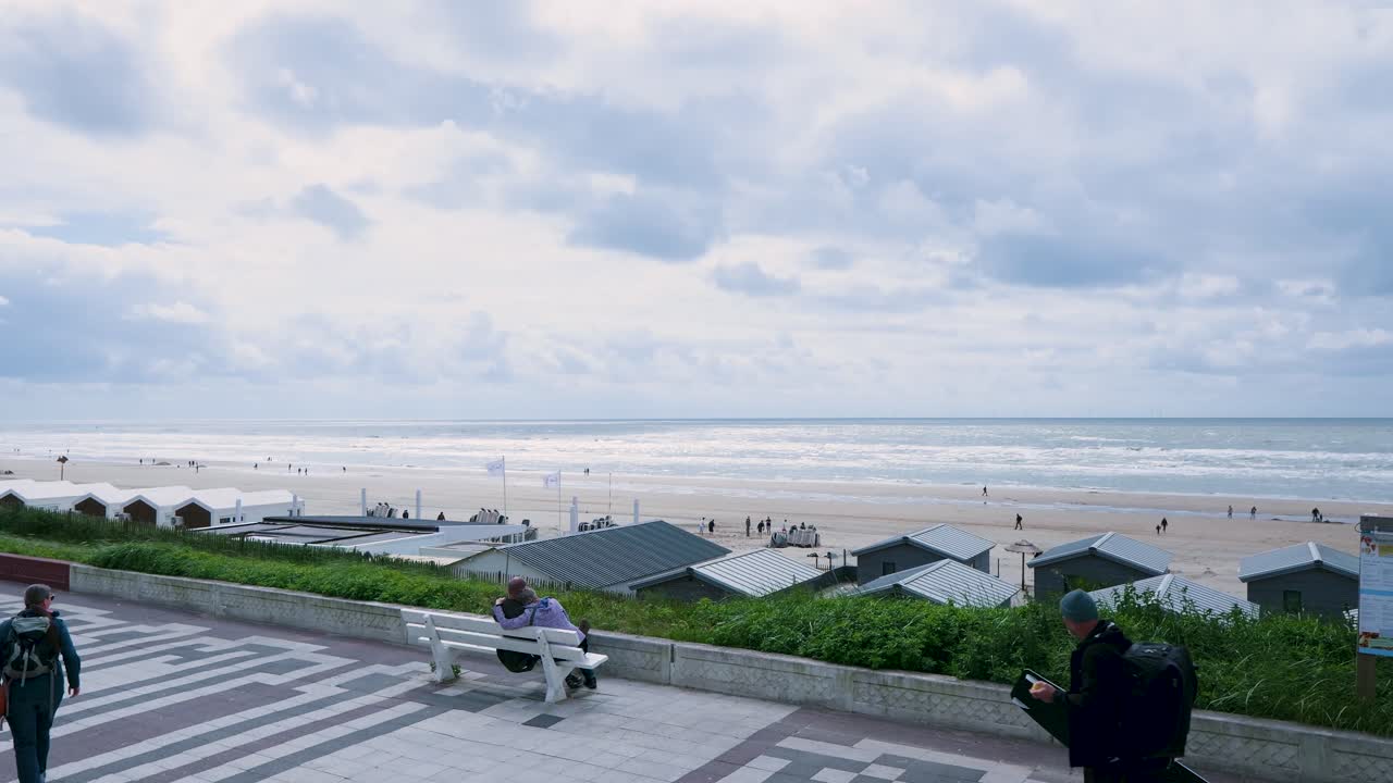 Beach Scene with People on a Cloudy Day