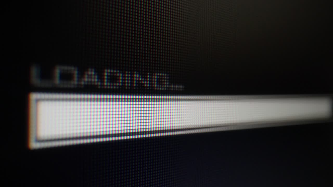 Extreme close up of a loading bar on a computer monitor