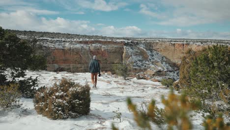 taking photos in a canyon covered in snow