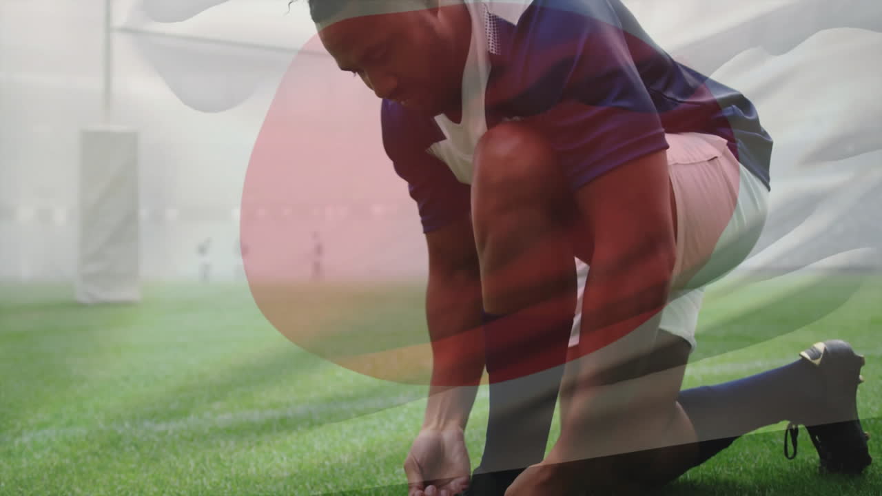 Tying shoelaces, rugby player with Japanese flag animation on field
