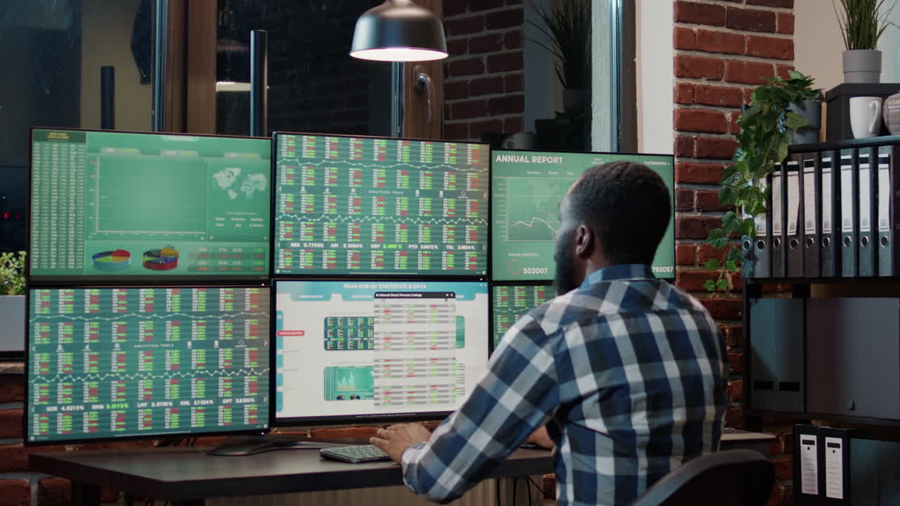 Fund trader monitoring exchange market sales numbers