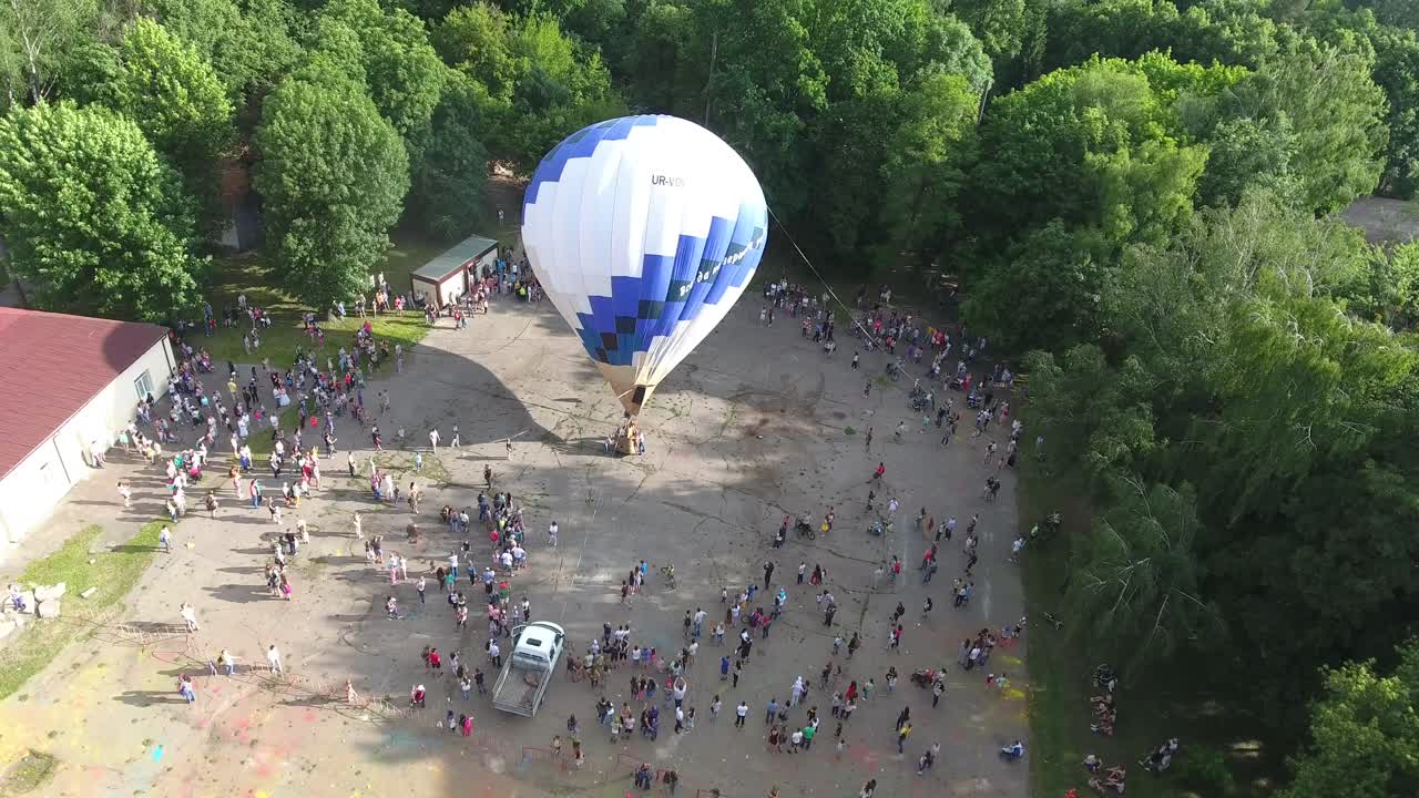 Air Balloon Is Getting Ready To Take Off. VINNITSA, UKRAINE - JULY 2017: Aerial shot of the hot air balloon is getting ready to take off in city park