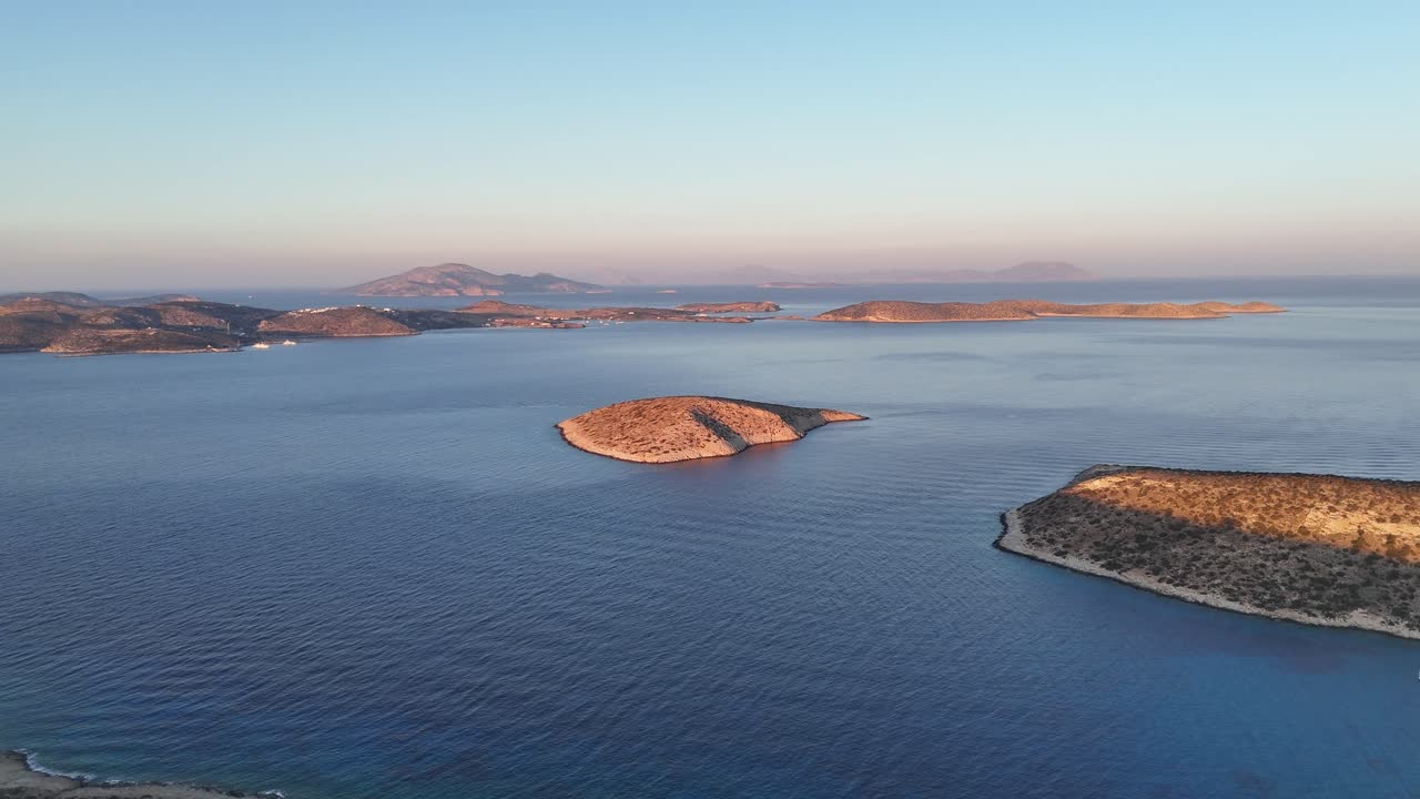Drone shot from Irakleia, with Schoinousa island in the background | Greek Islands i| Aegean sea and Small Cyclades | | 4K drone shot