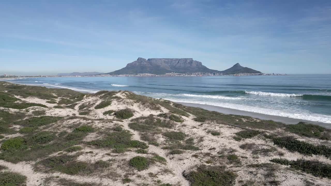 Drone flying over Blouberg Beach with Table Mountain in the background