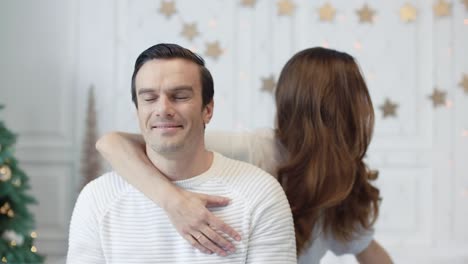 beautiful family celebrating new year holiday in luxury house together