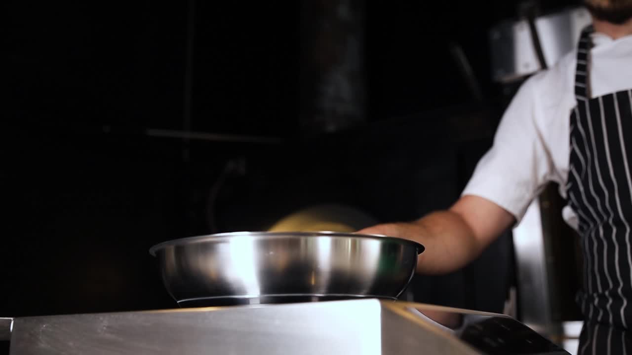 Chef Cooking with a Pan