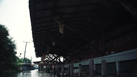 Sailing-on-a-canal-under-the-Thailand-flags