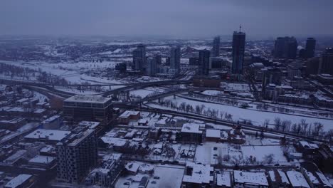 witness the magic of a winter wonderland veiled in fog with this captivating drone footage of a downtown