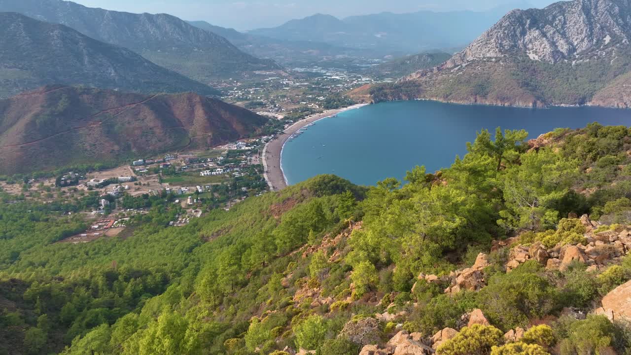 Panoramic View of a Coastal Bay with Mountains