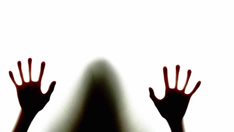 hands reaching through a window