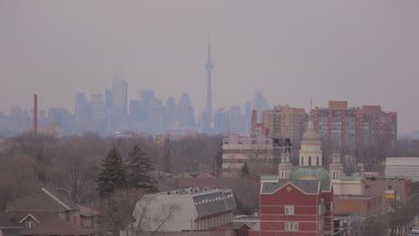 footage of a foggy toronto skyline.