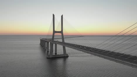 Amazing-view-of-Vasco-da-Gama-Bridge-at-sunset,-Lisbon-in-Portugal