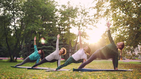women practicing yoga outdoors