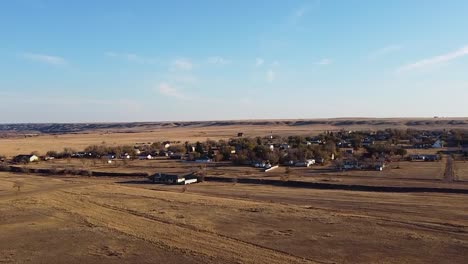 Drone-view-over-head-of-the-town-of-Empress-Alberta-Canada-during-the-daytime-in-the-prairies